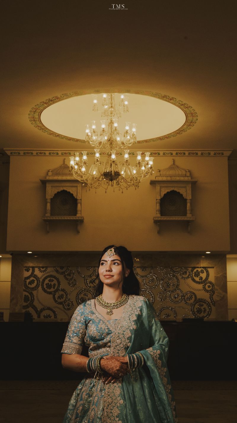 Authentic moment of Uday and Isha smiling during wedding photography